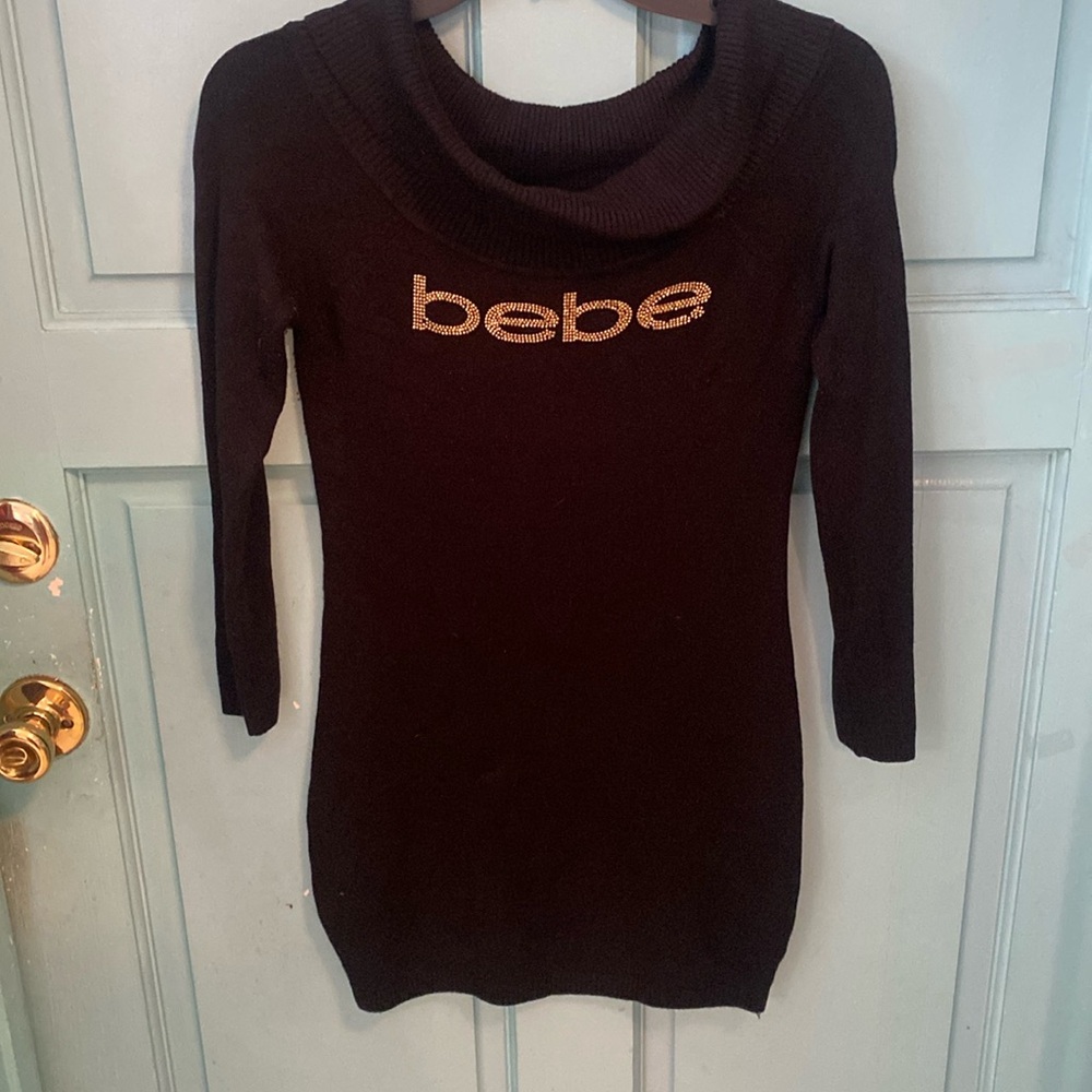 Bebe short dress or long sweater(if you are short) sizeM,but looks Small. # 3430